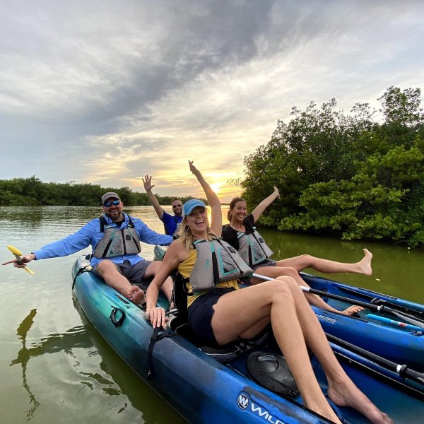 a person sitting on a raft in a body of water