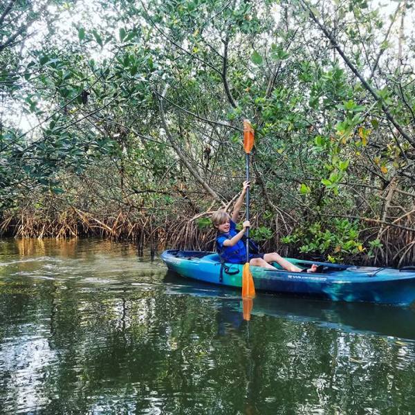 a small boat in a body of water