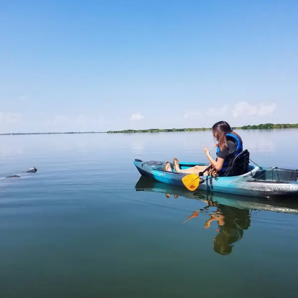 a small boat in a body of water