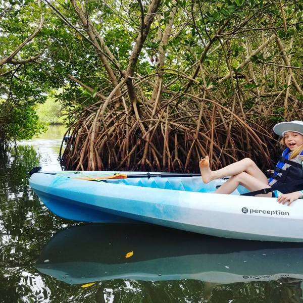 a small boat in a body of water
