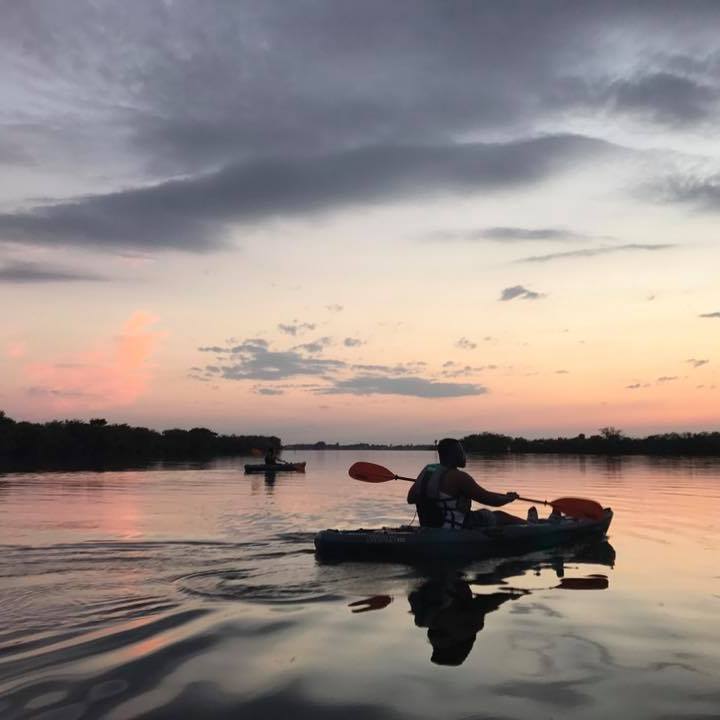 a sunset over a body of water