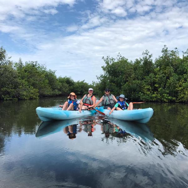 a small boat in a body of water