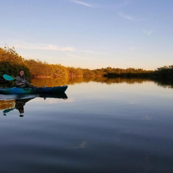 a small boat in a body of water