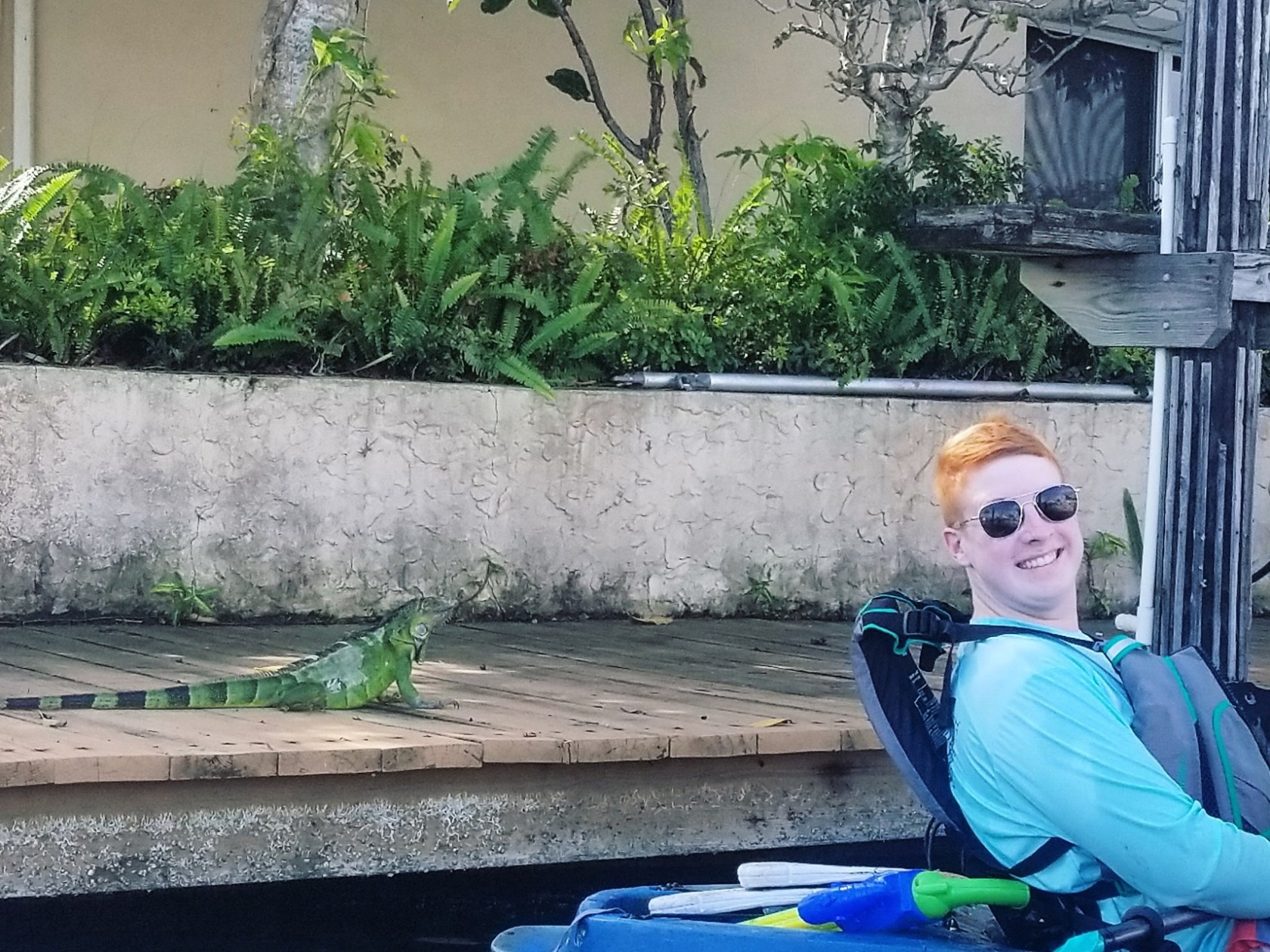 a person sitting in front of a building