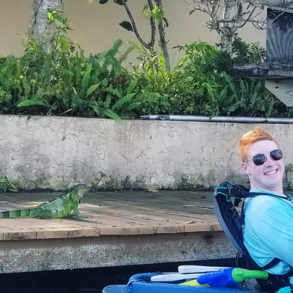 a person sitting in front of a building