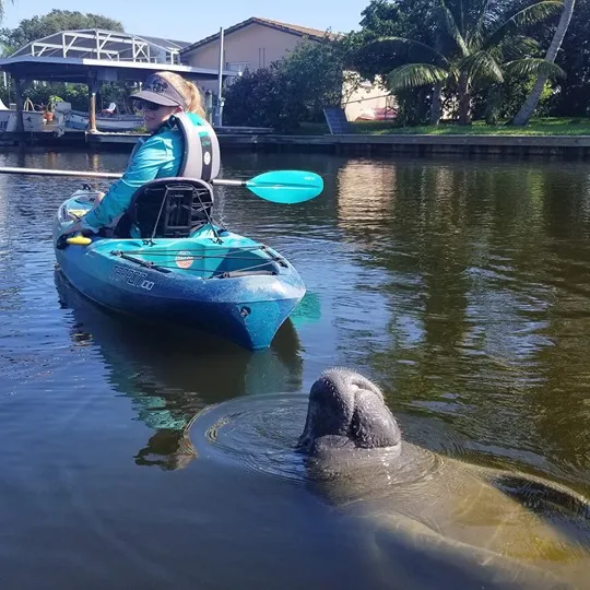 a small boat in a body of water
