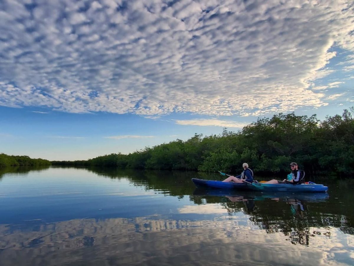 a small boat in a body of water