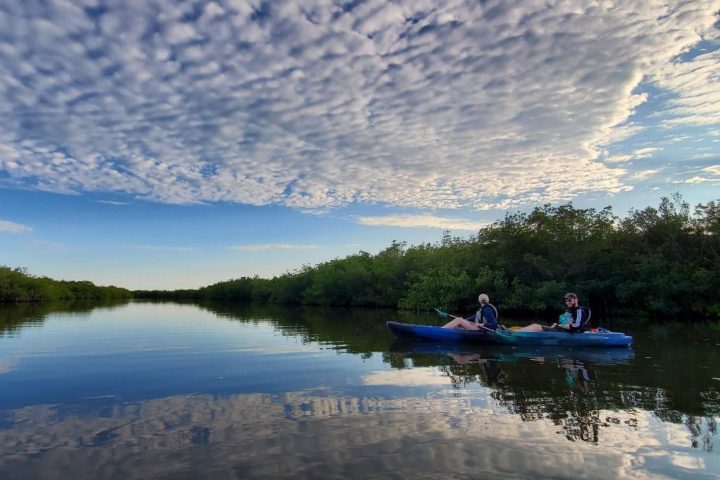 a small boat in a body of water