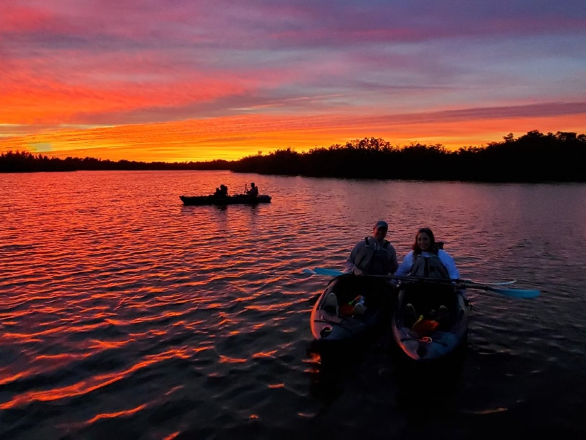a sunset over a body of water