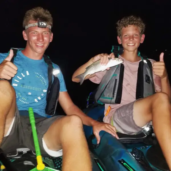 two people sitting posing for the camera