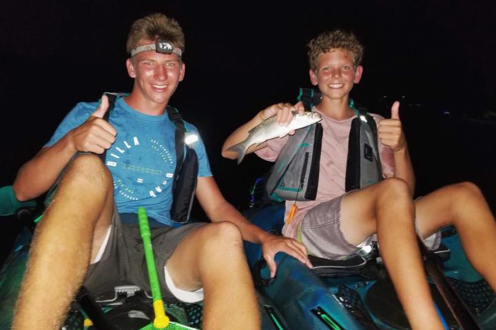 two people sitting posing for the camera