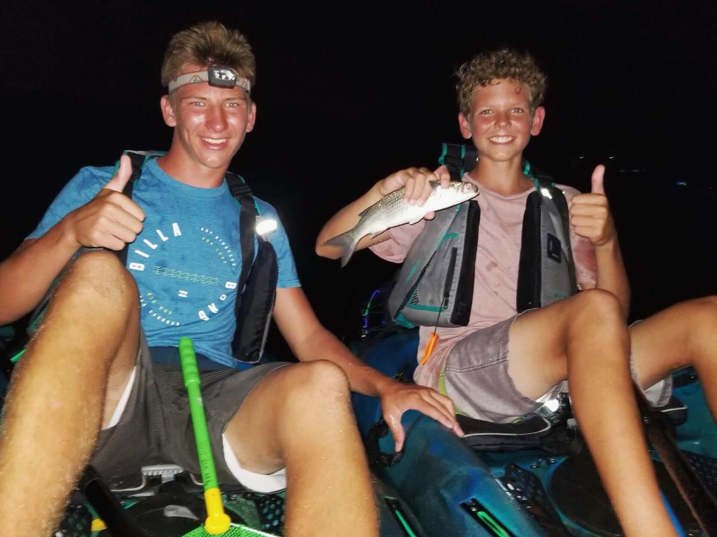 two people sitting posing for the camera