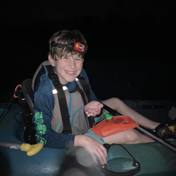 a person sitting on a boat