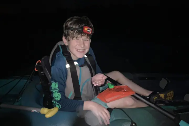 a person sitting on a boat