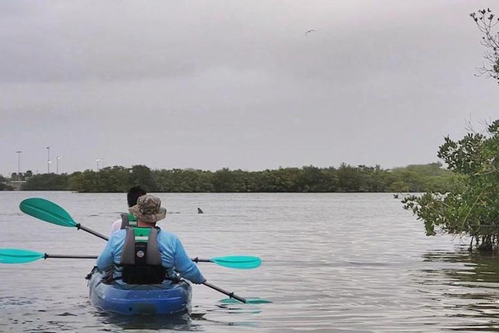 a small boat in a body of water