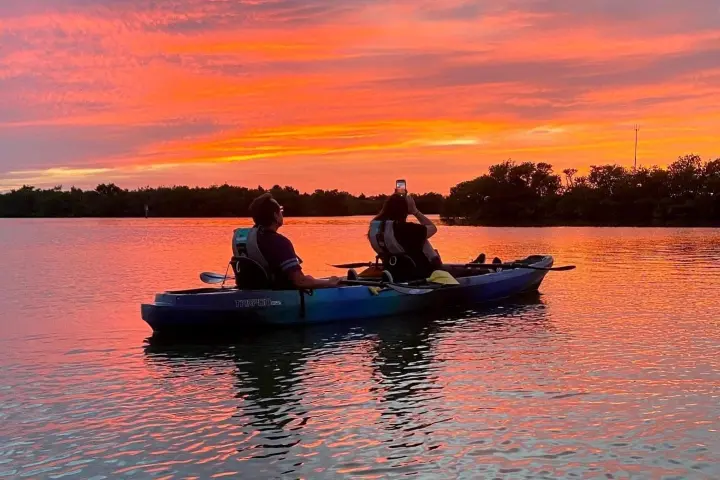 a small boat in a body of water