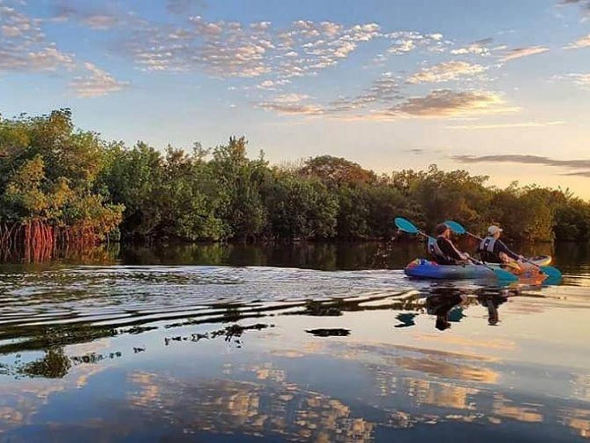 a small boat in a body of water