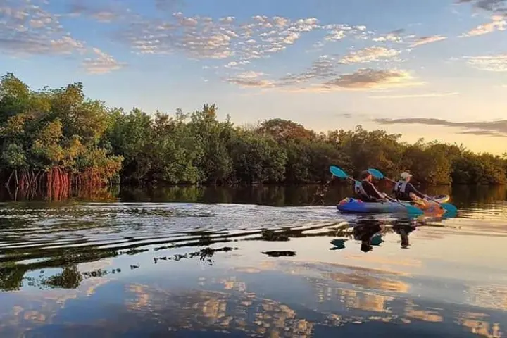 a small boat in a body of water