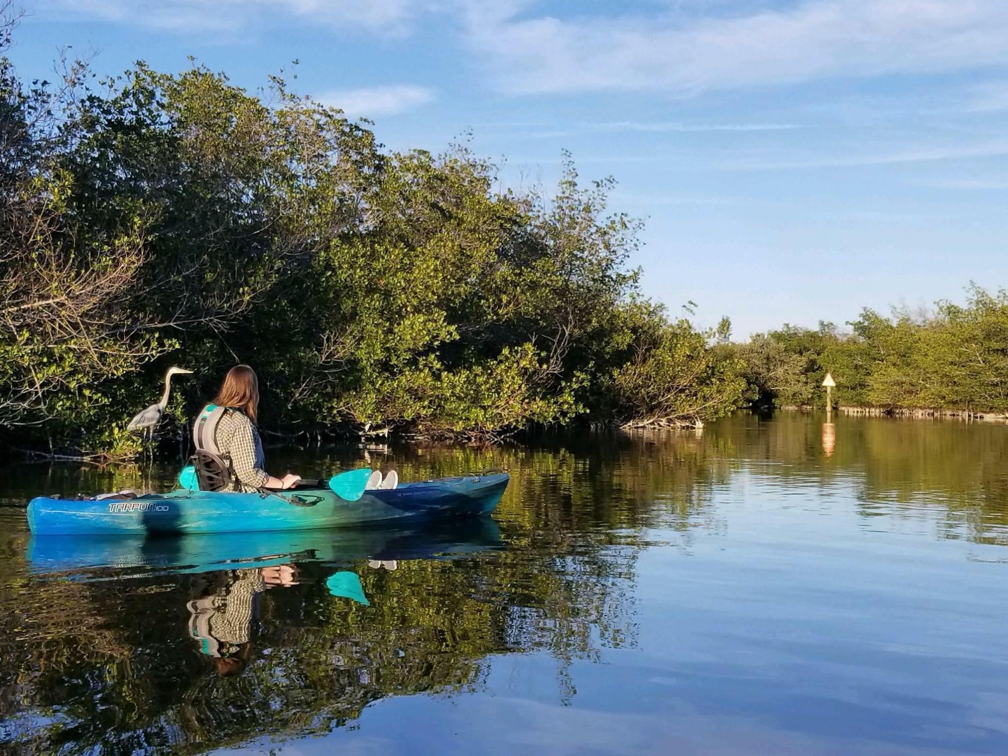 a small boat in a body of water