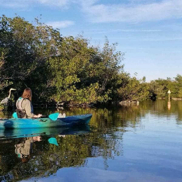 a small boat in a body of water