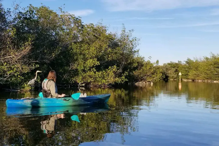a small boat in a body of water