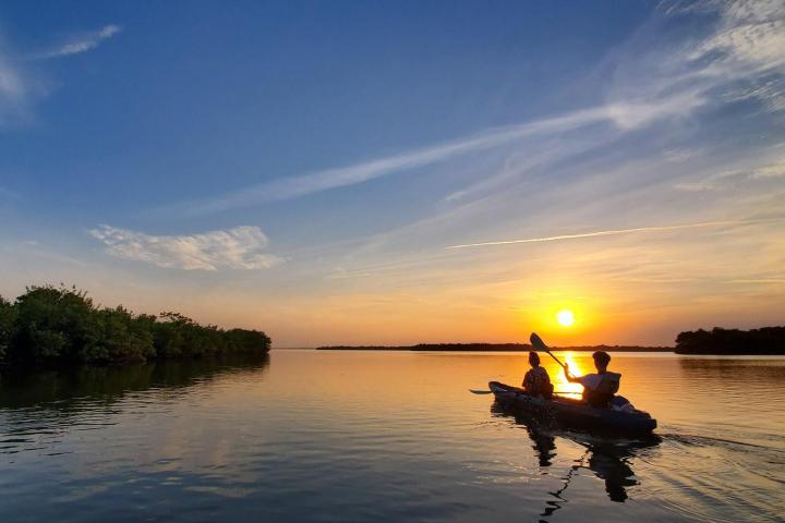 a small boat in a body of water