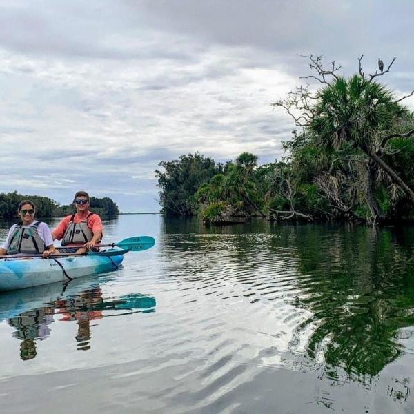 a small boat in a body of water