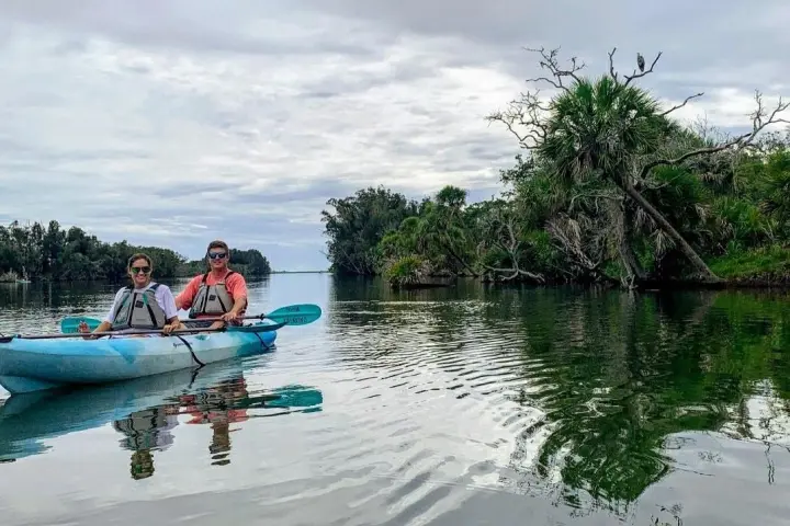 a small boat in a body of water