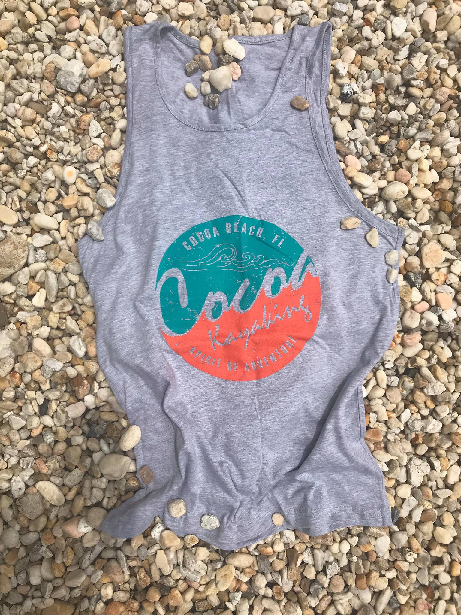 a stuffed elephant on a rock