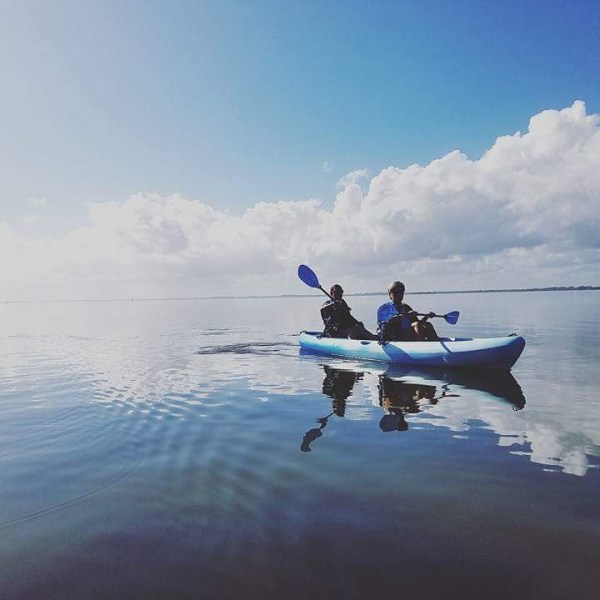 a small boat in a body of water