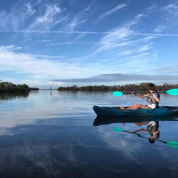 a small boat in a body of water