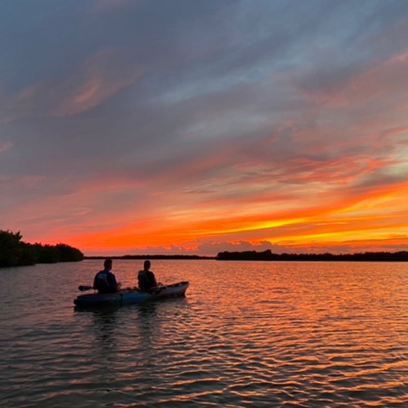 a small boat in a body of water