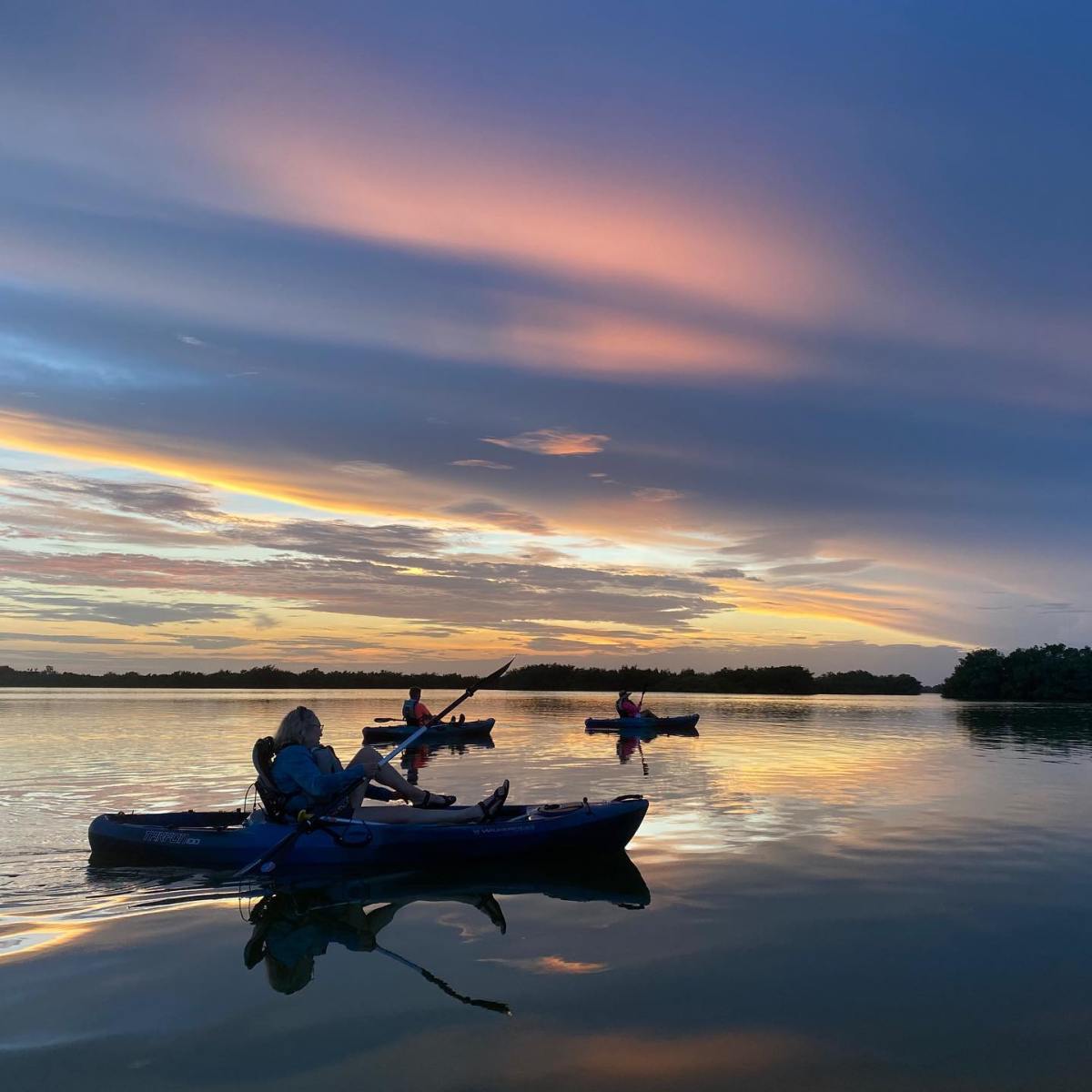 a sunset over a body of water