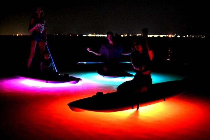 a group of people in a dark room