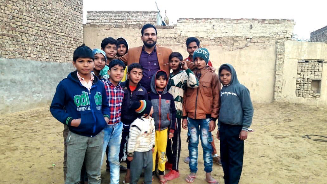 4ACD4F52-DC0B-485A-9C6C-14399A50E262 a group of people posing for a photo