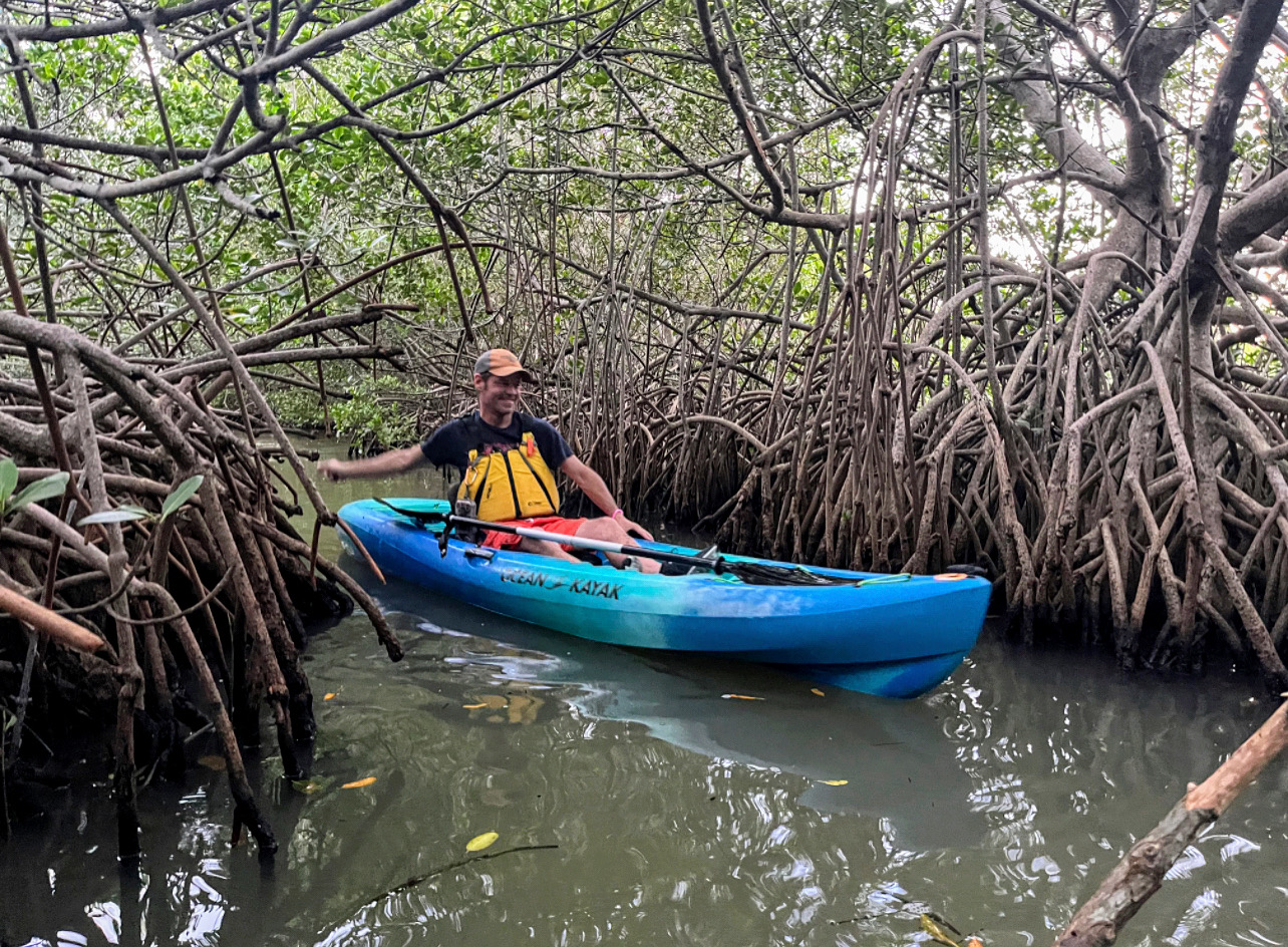 a small boat in a body of water