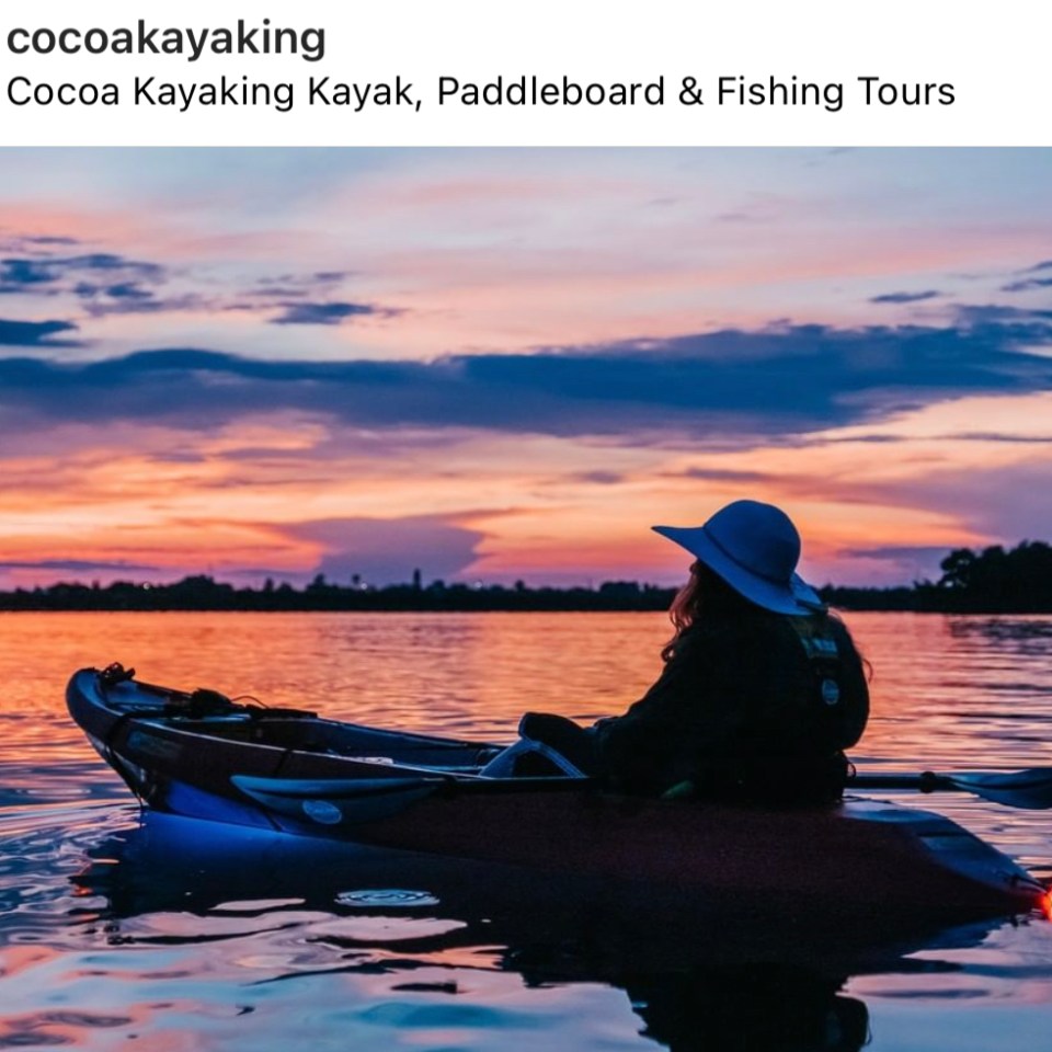a person sitting on a boat in the water