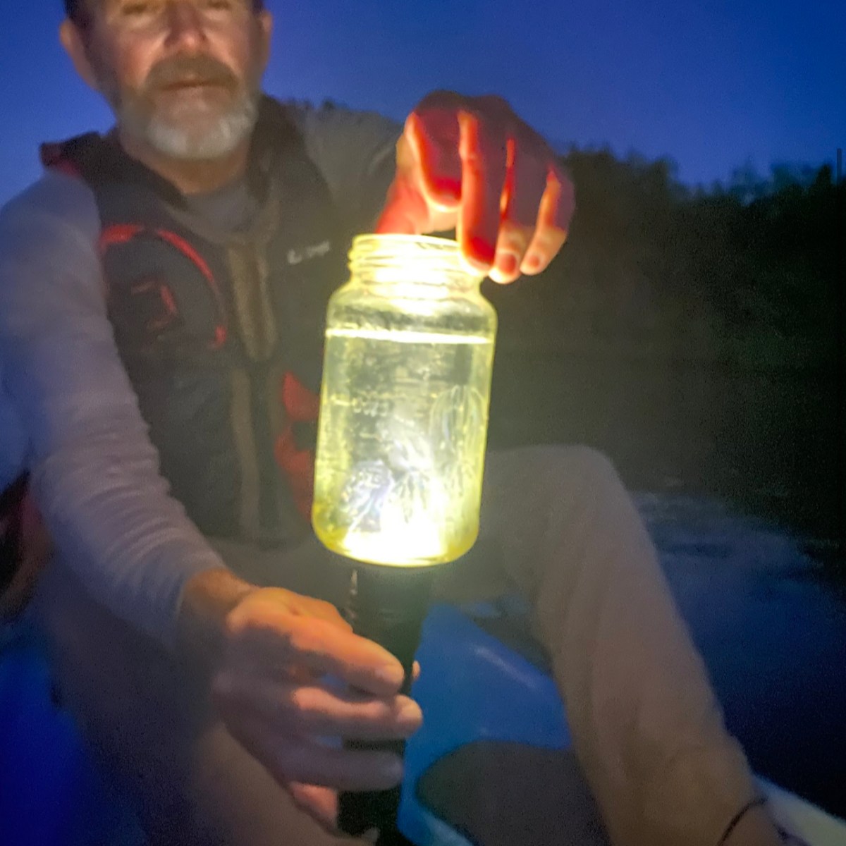 a man holding a glass of wine