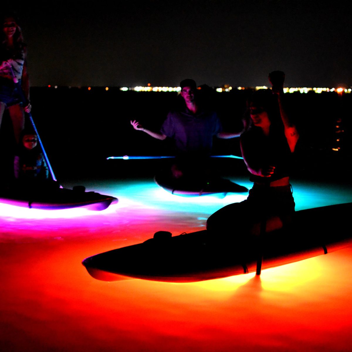 a group of people in a dark room