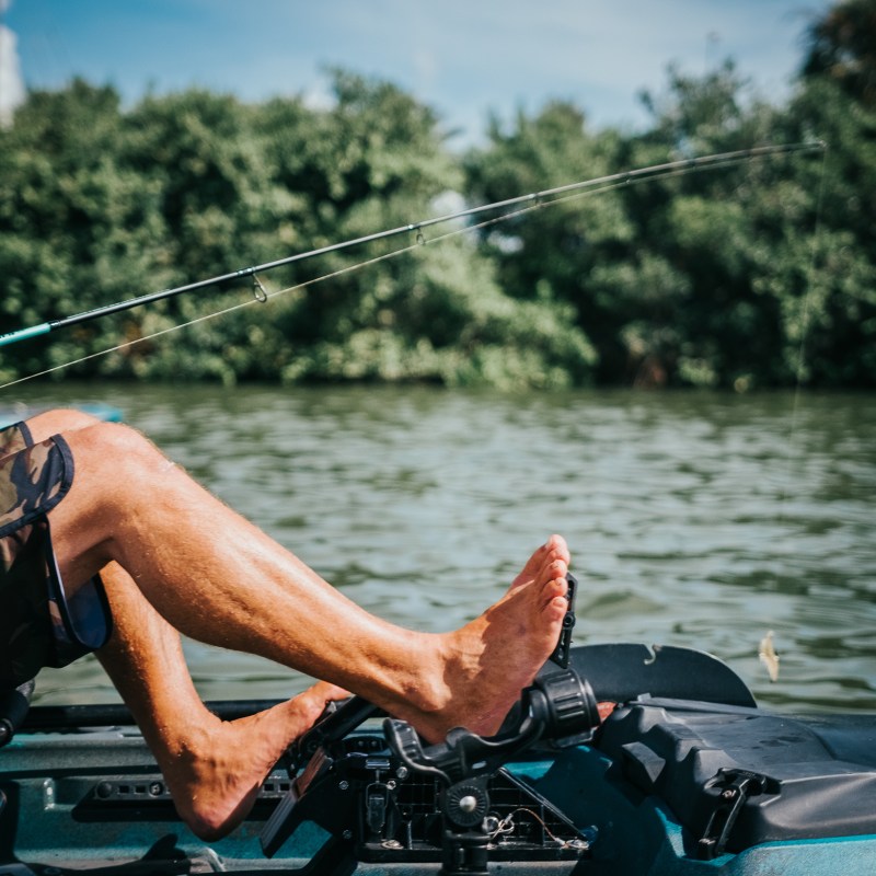 a man riding on the back of a boat