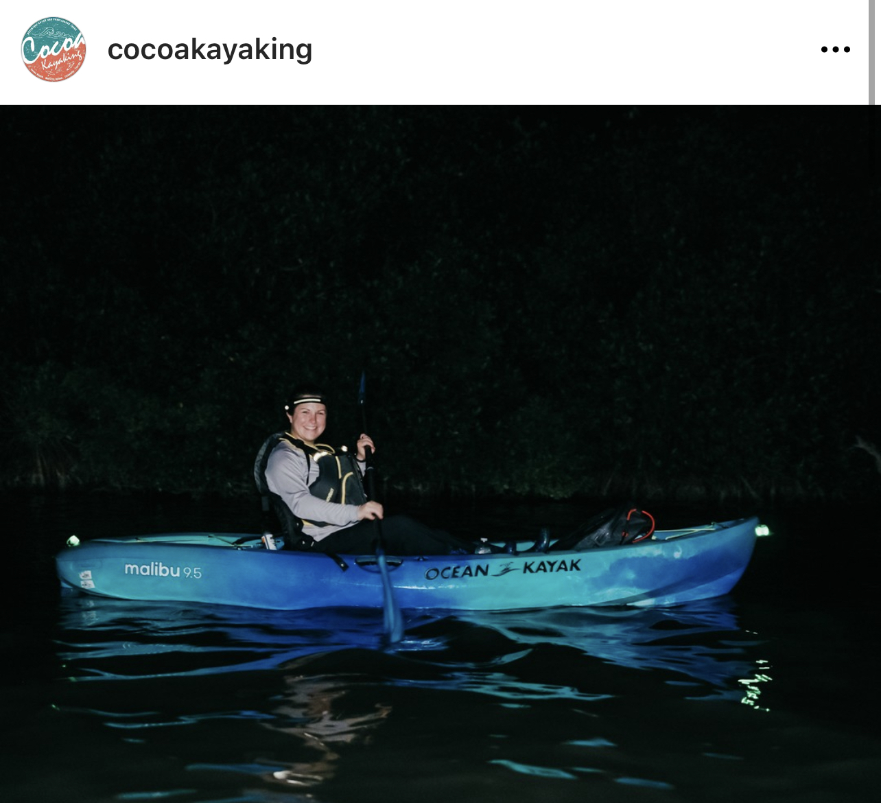 4C70C438-78C3-4C78-8200-842EDEC7D68C a man riding on the back of a boat in the water