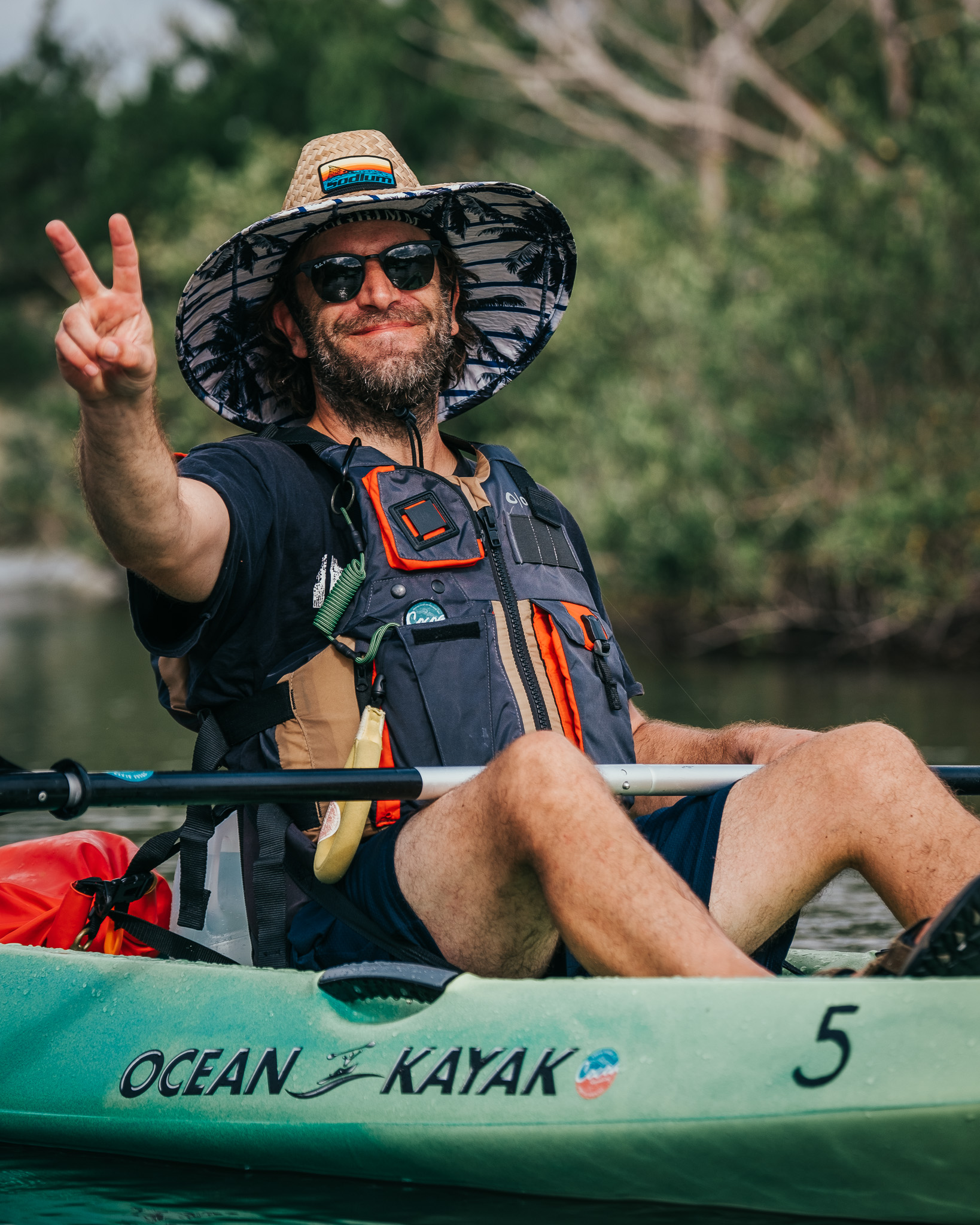 a group of people riding on the back of a boat