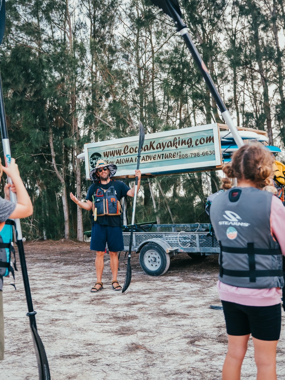 a group of people walking down the street