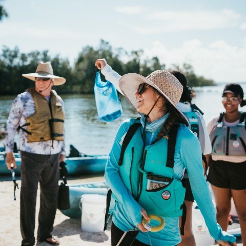 a group of people that are standing in the water