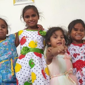 a little girl posing for a picture