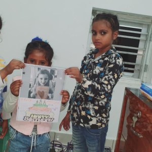 a little boy that is standing in a room