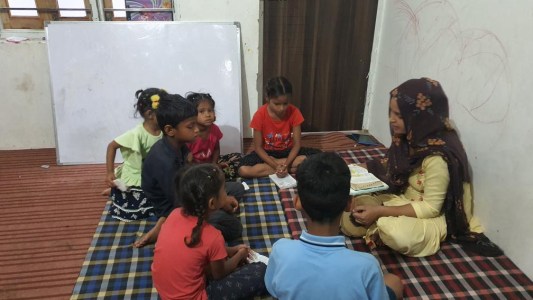 a group of people sitting in a room