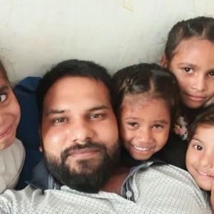 a group of people posing for the camera