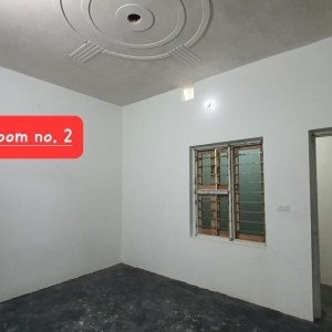 a room with a sink and a mirror