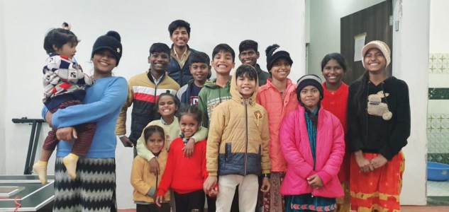 a group of people posing for a photo